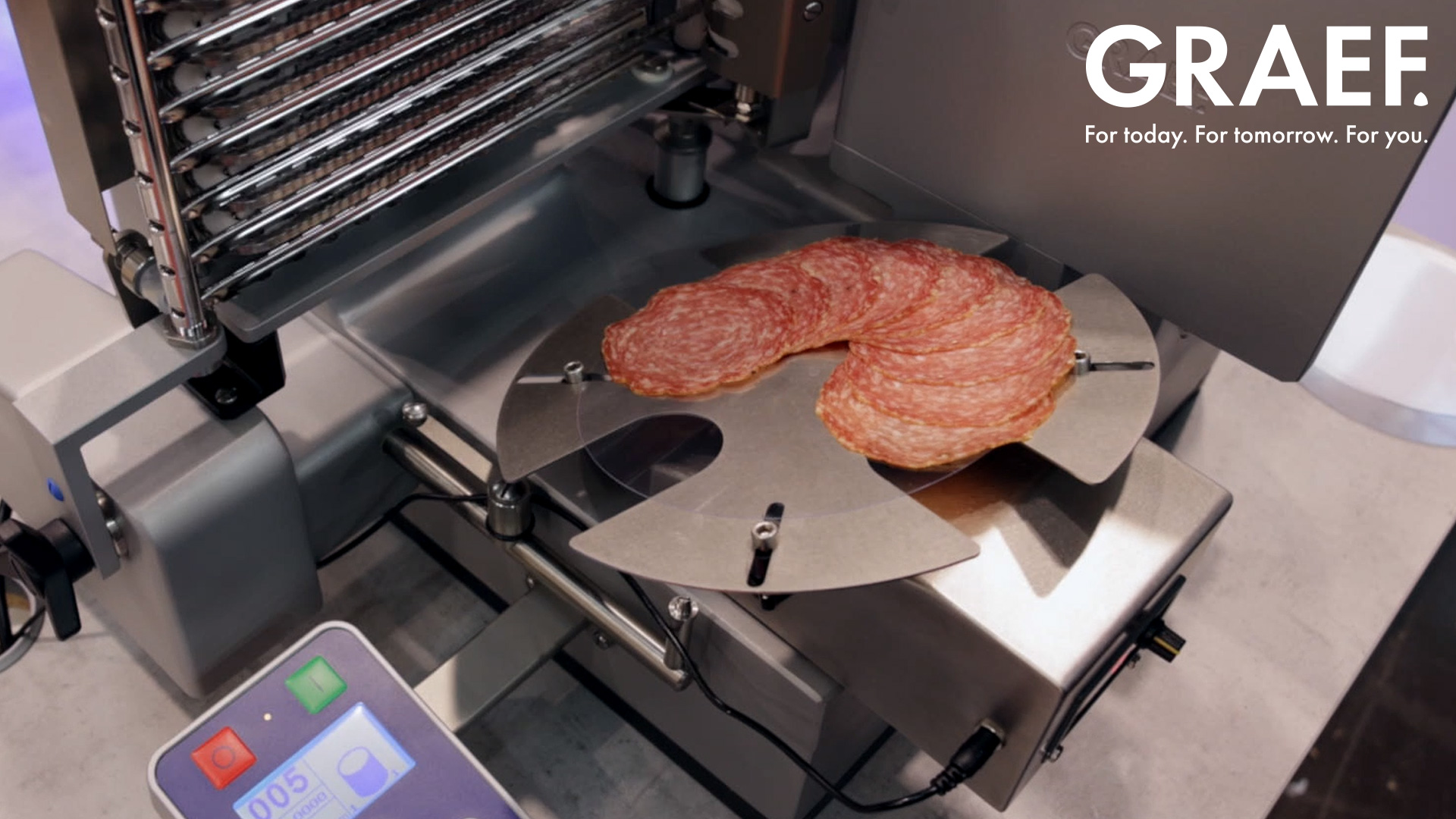 Trancheuse à saucisson avec logo GRAEF, pour une utilisation quotidienne.