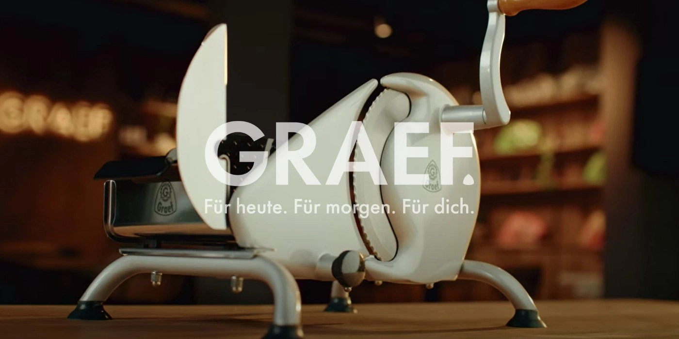 Graef Allesschneider, weiß, mit Slogan: Für heute. Für morgen. Für dich.
