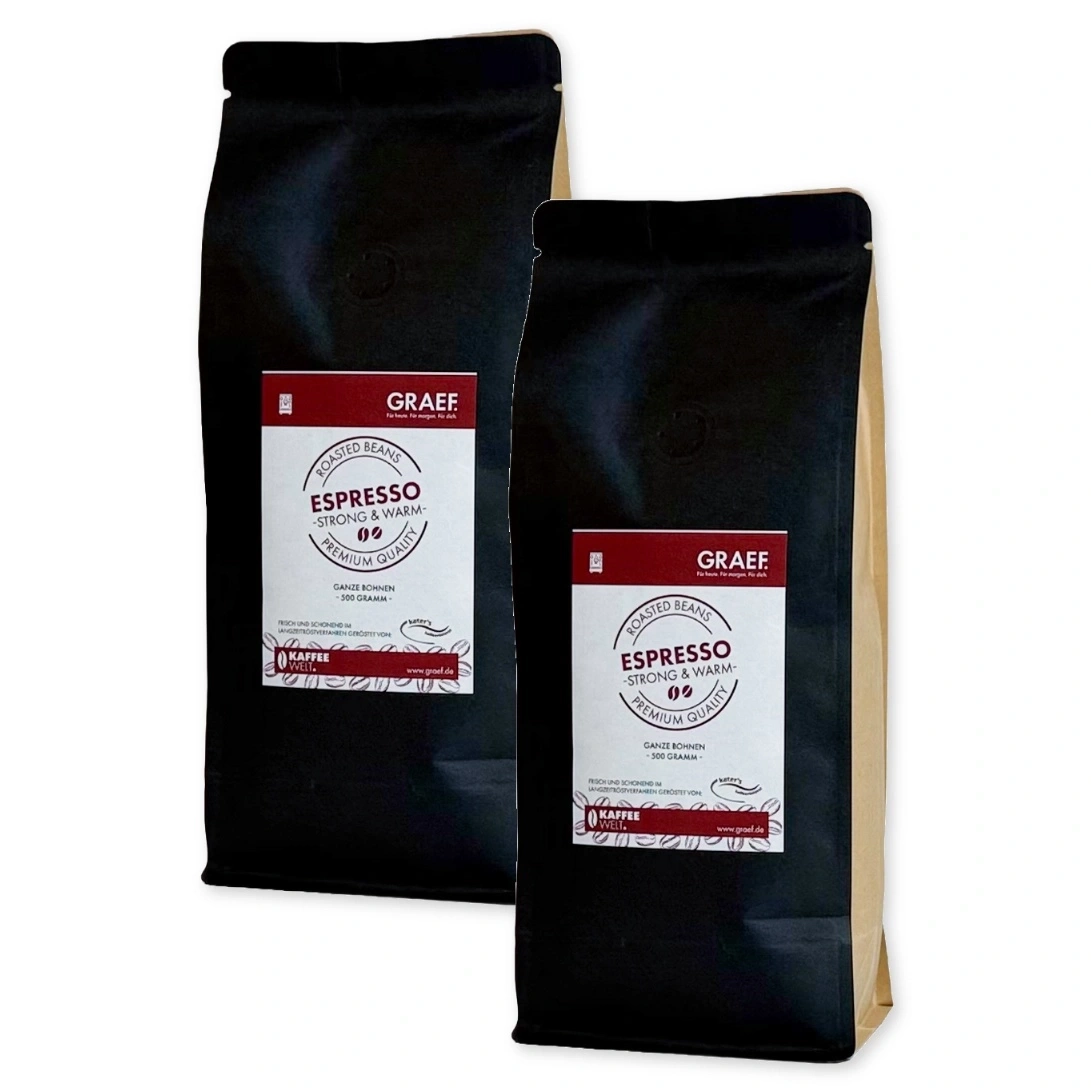 Zwei schwarze Kaffeebeutel mit rotem Etikett, "GRAEF ESPRESSO" drauf.