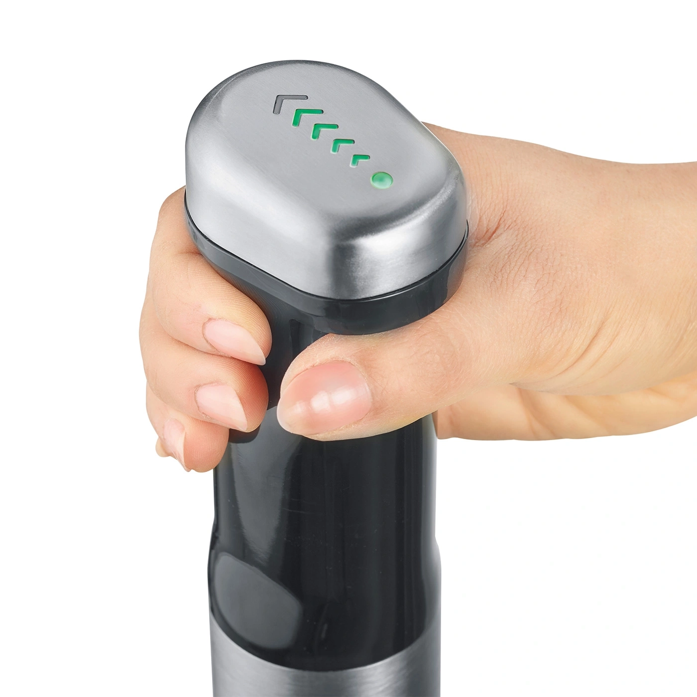 Hand hält Stabmixer mit grünen Lichtern und Pfeilen