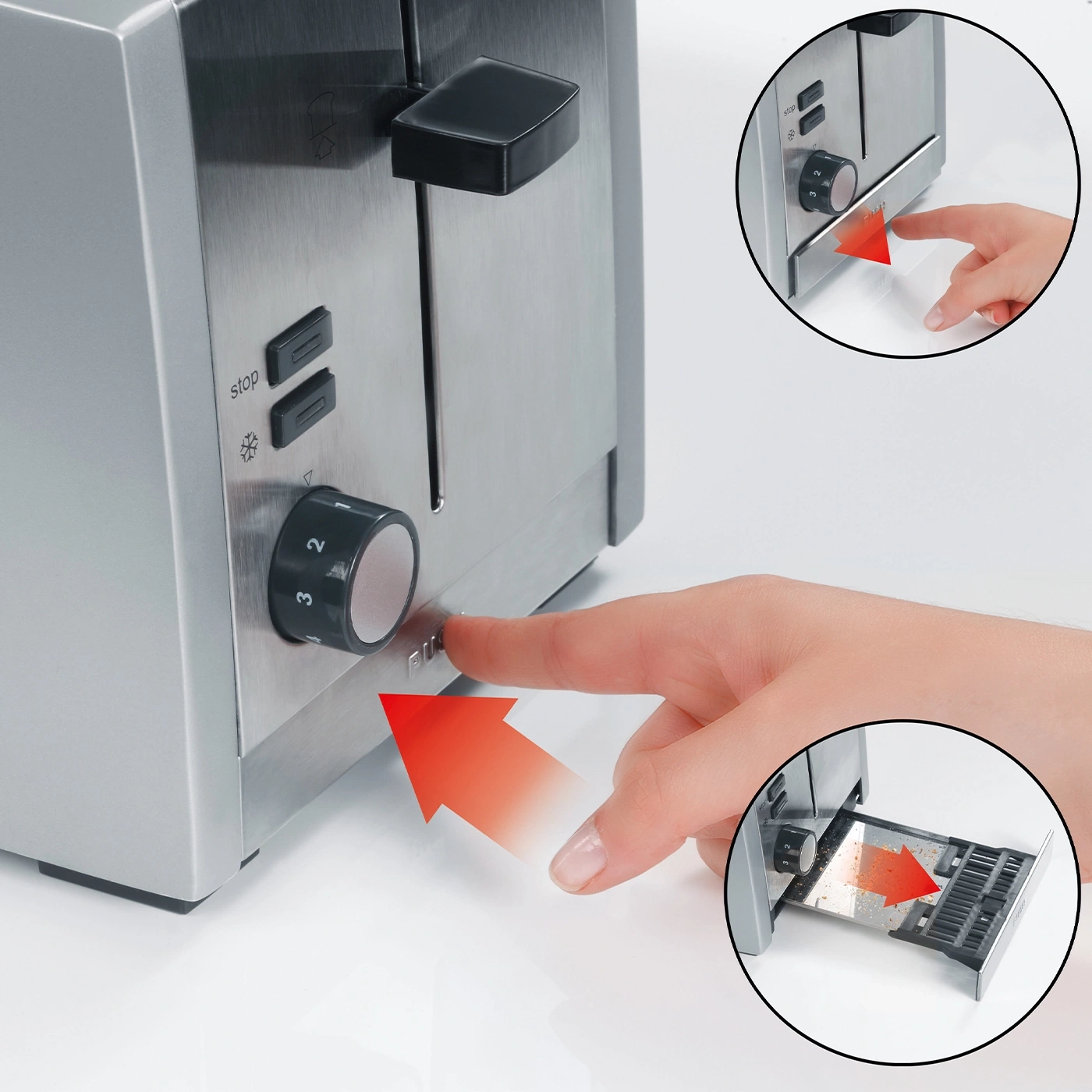 Ein Finger drückt auf den Knopf, um den Toaster zu bedienen.