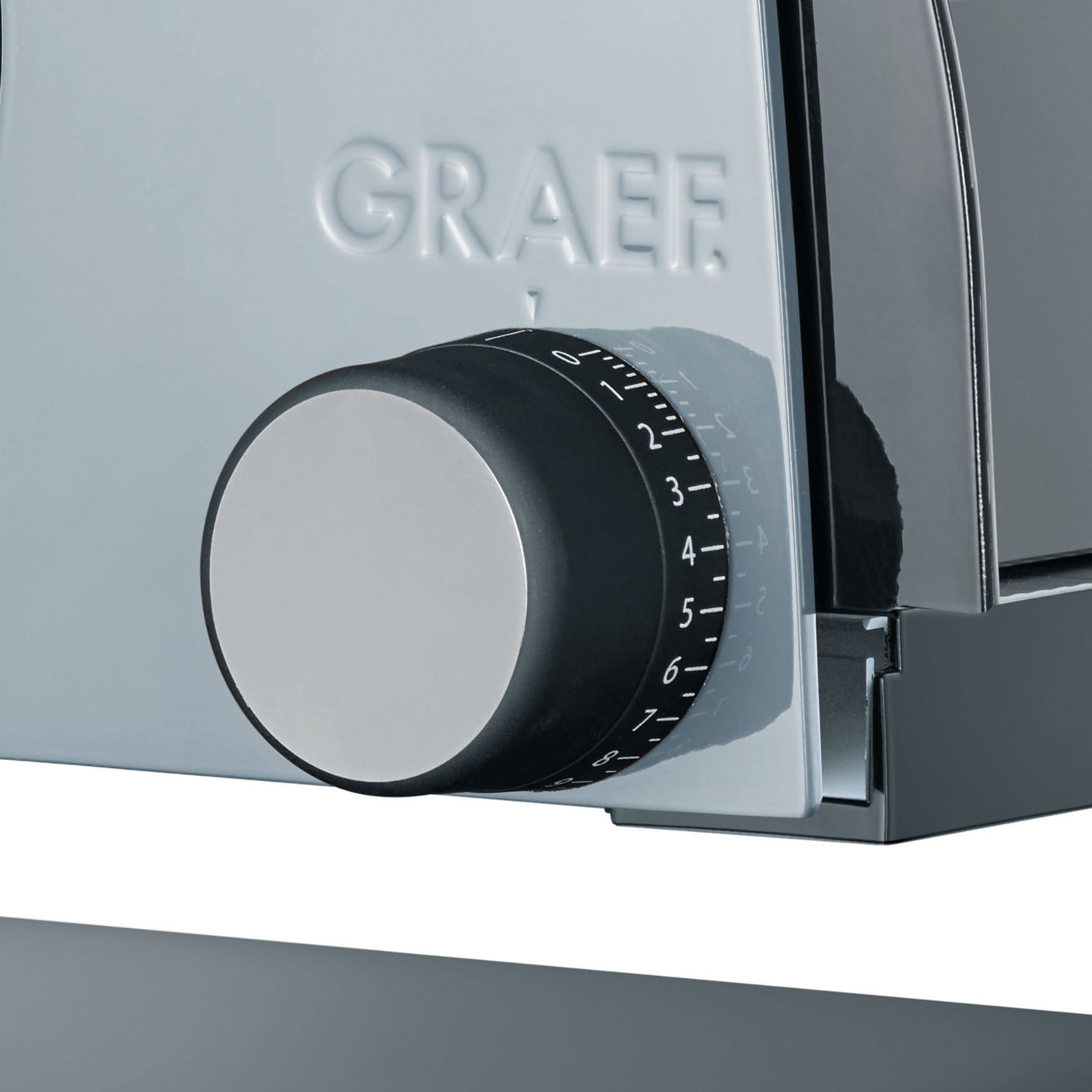 Ein Detail einer Graef Aufschnittmaschine mit Drehknopf und Skala.