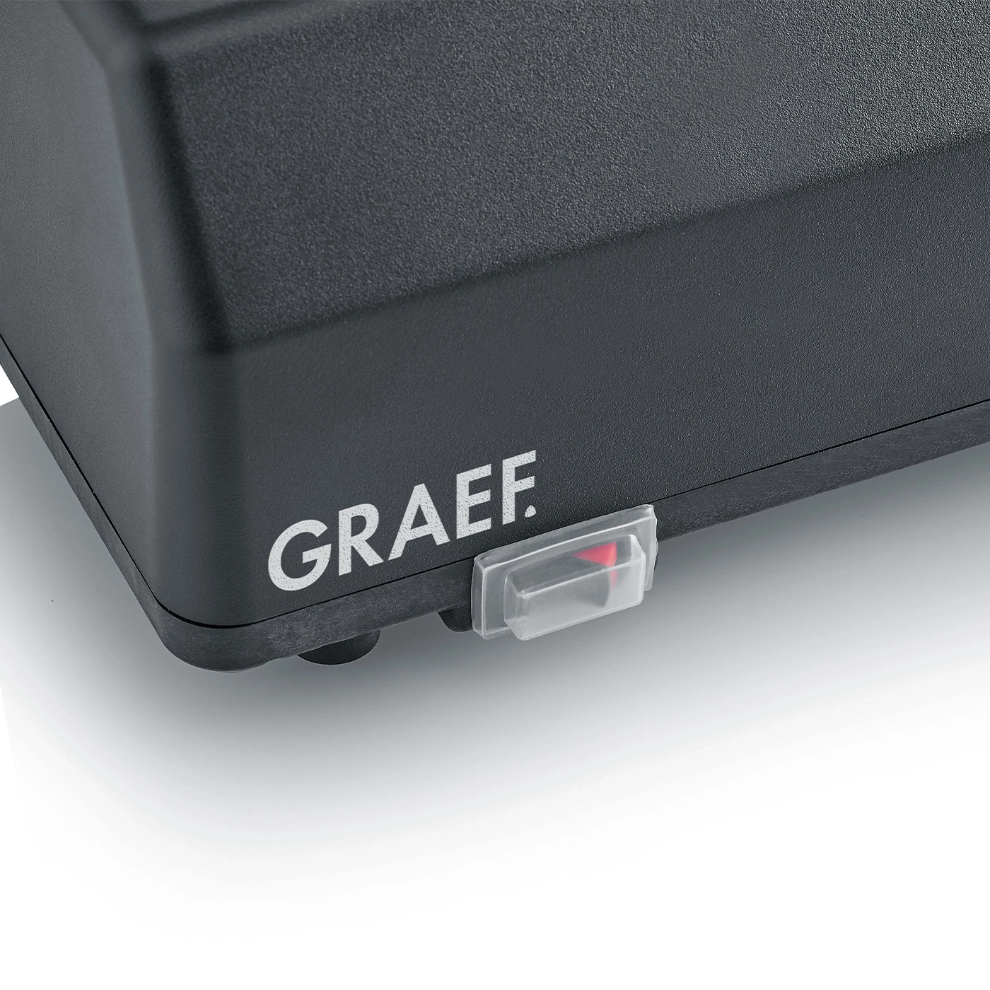 Graef-Gerät, schwarzes Gehäuse, roter Schalter, Detailaufnahme, Nahaufnahme, Gerät