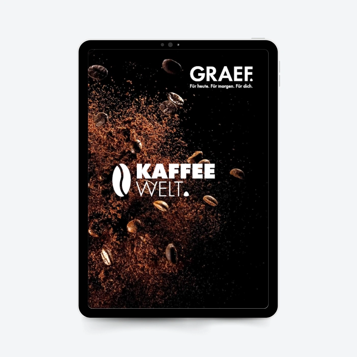 Tablet mit Kaffee-Werbung: GRAEF und KAFFEE WELT, Kaffeebohnen fliegen.