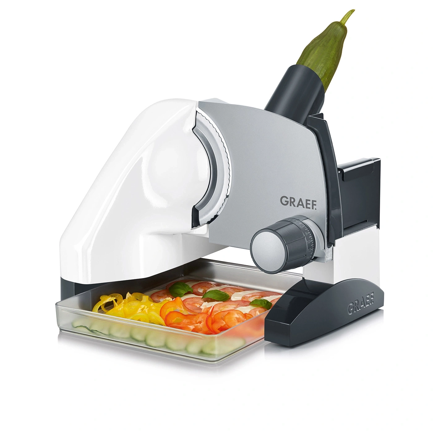 Graef Allesschneider mit Gemüse und Tomaten in der Auffangschale
