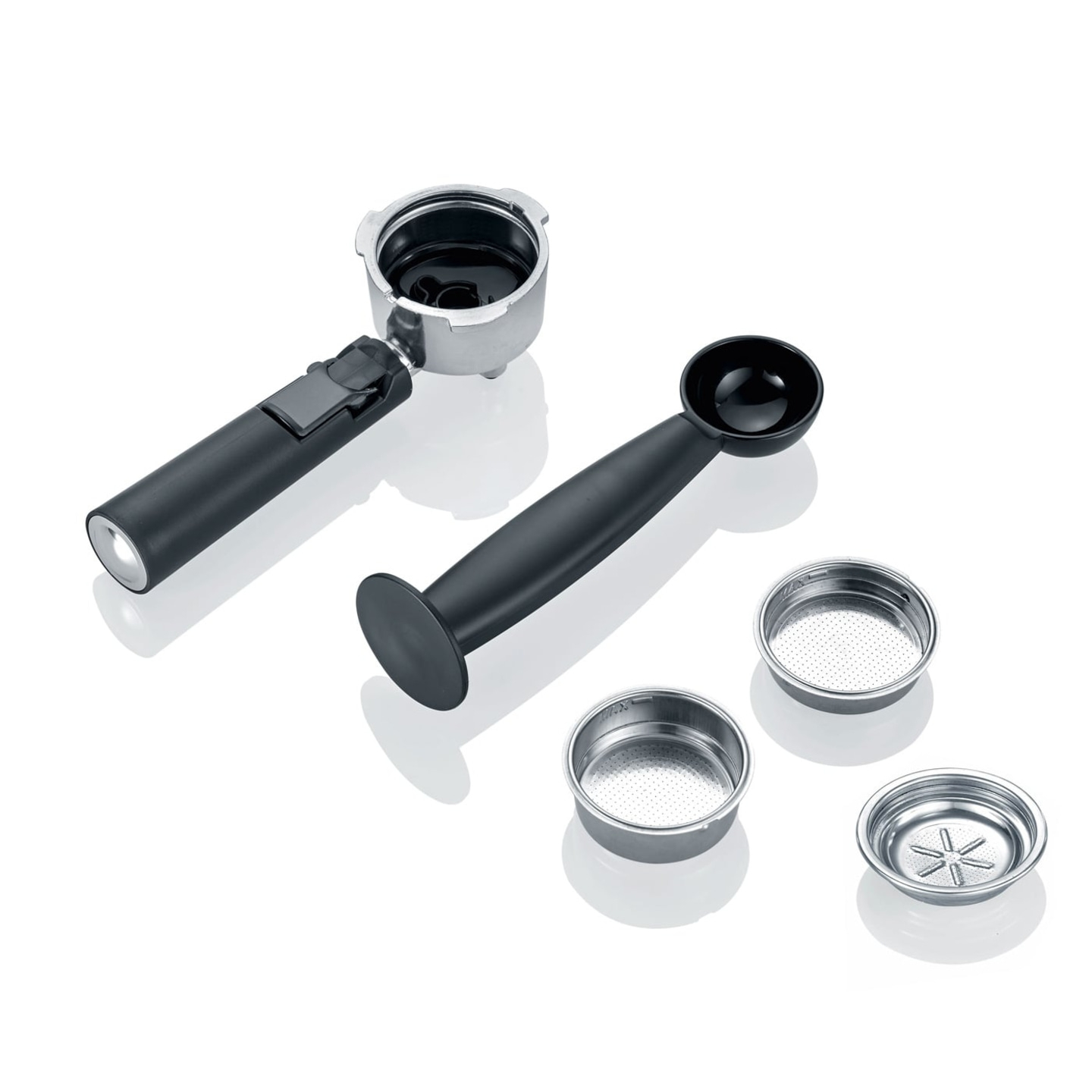 Espresso machine accessories: portafilter, scoop, and filters for coffee preparation