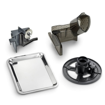 Küchengerät-Zubehör: Schneidevorrichtung, Auffangschale, Trichter und Basis.