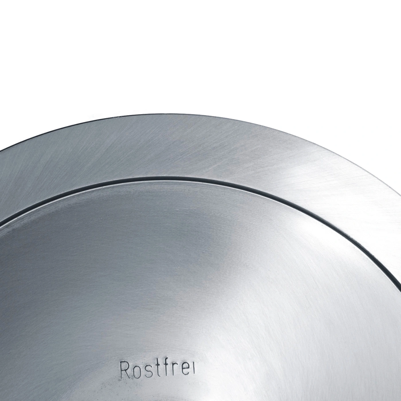 Nahaufnahme einer silbernen Metalloberfläche mit der Aufschrift Rostfrei.
