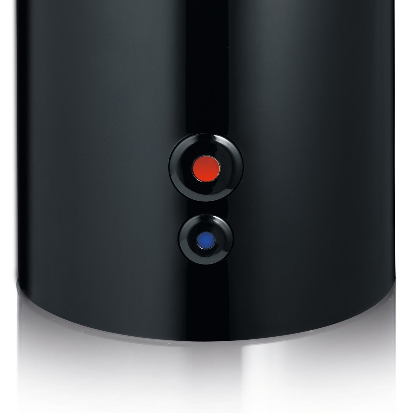 Appareil noir avec boutons rouges et bleus, surface brillante, gros plan, design minimaliste