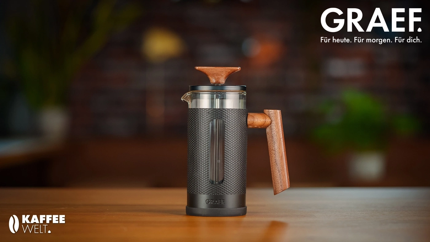 GRAEF Kaffeebereiter mit Holzgriff und Kaffeewelt Logo.