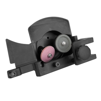 Black tool with grinding wheels and knobs, close-up, angled view